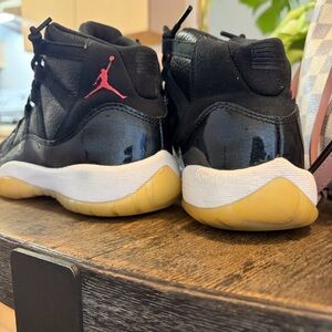 Air Jordan Kids' Black and Pink High-Top Basketball Shoes